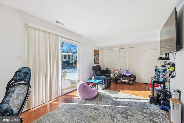 playroom with hardwood / wood-style flooring