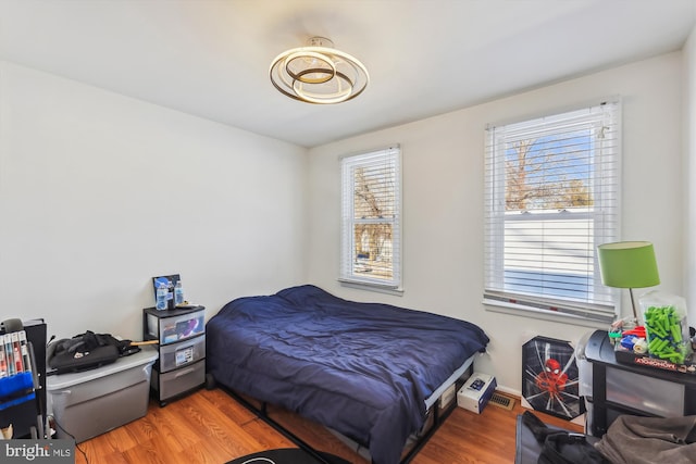 bedroom featuring hardwood / wood-style flooring