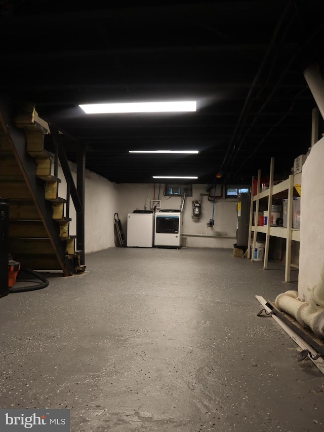 basement with washing machine and dryer