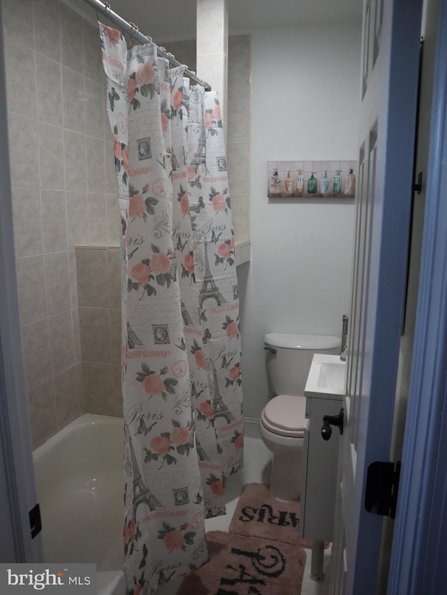 full bathroom with toilet, vanity, and shower / tub combo with curtain