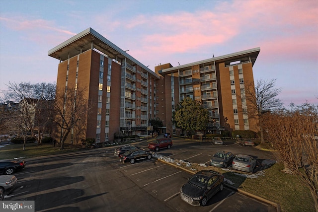 view of outdoor building at dusk