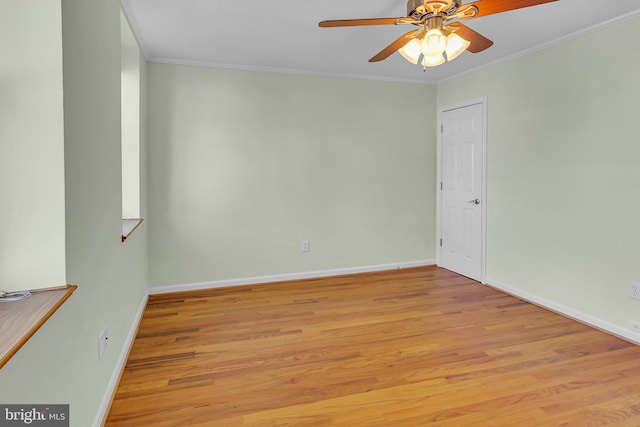 unfurnished room featuring light wood-type flooring, ceiling fan, and ornamental molding