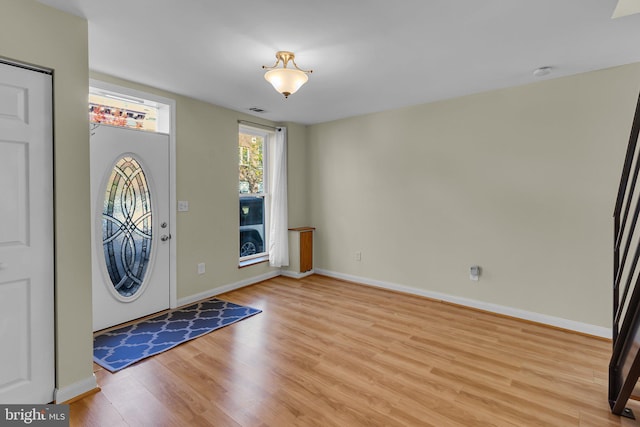 foyer with light hardwood / wood-style flooring