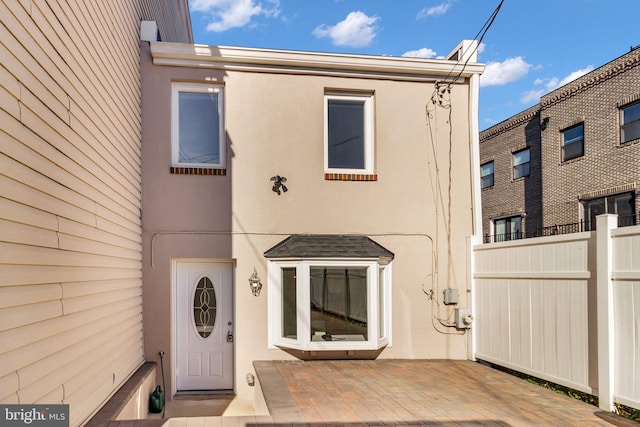 doorway to property with a patio