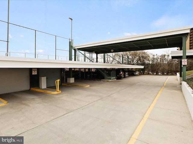 view of parking featuring a carport