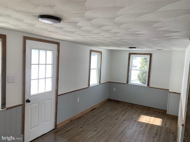 interior space with hardwood / wood-style flooring