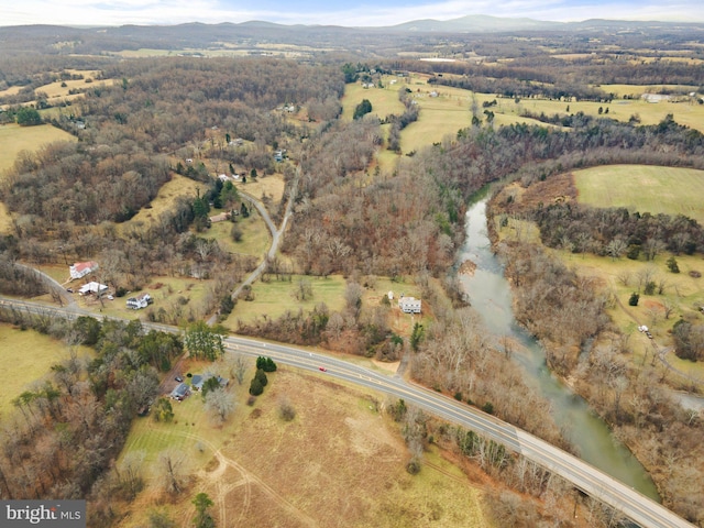 bird's eye view featuring a rural view and a water and mountain view