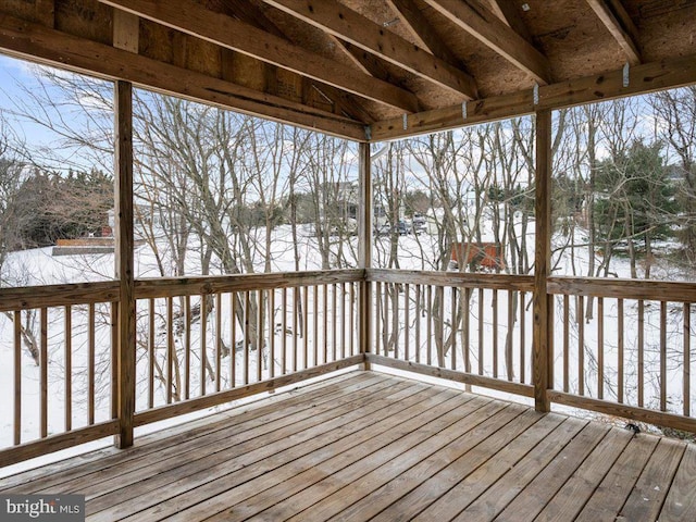 view of snow covered deck