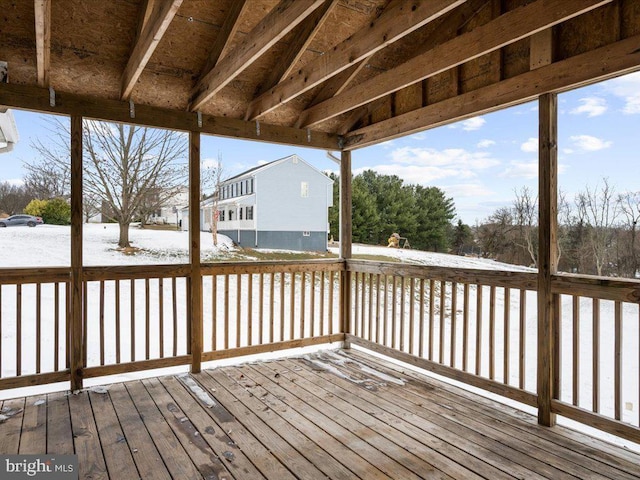 view of snow covered deck