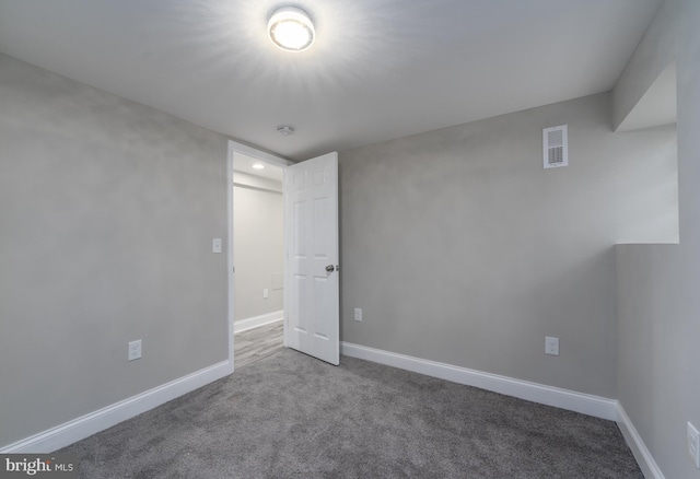 view of carpeted spare room