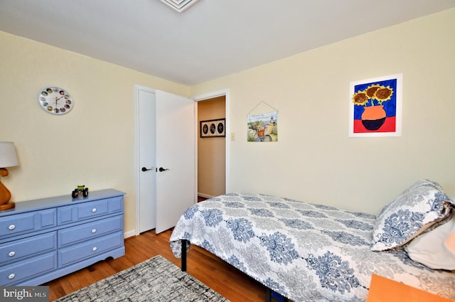 bedroom with light wood-type flooring