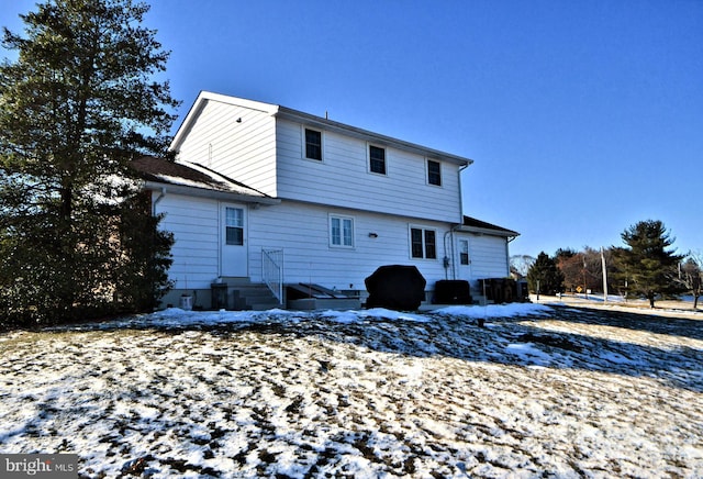 view of snow covered house