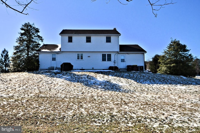 view of snow covered house