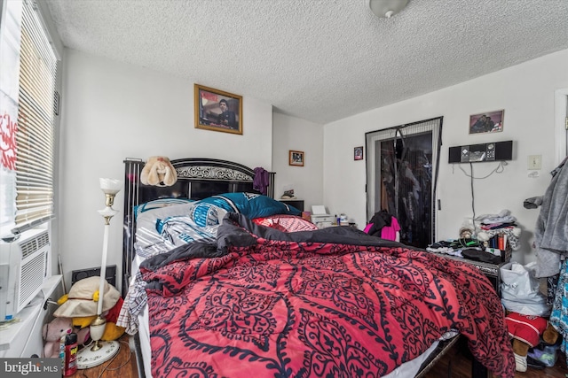 bedroom featuring a textured ceiling