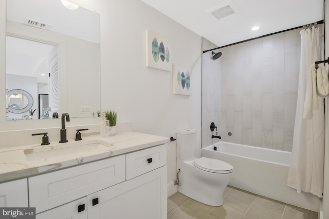 full bathroom with tile patterned floors, vanity, toilet, and shower / bathtub combination with curtain