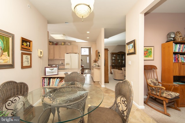 dining room featuring sink