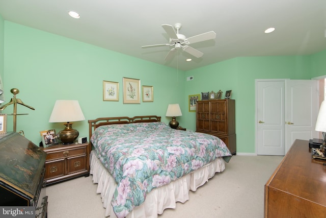 carpeted bedroom with ceiling fan