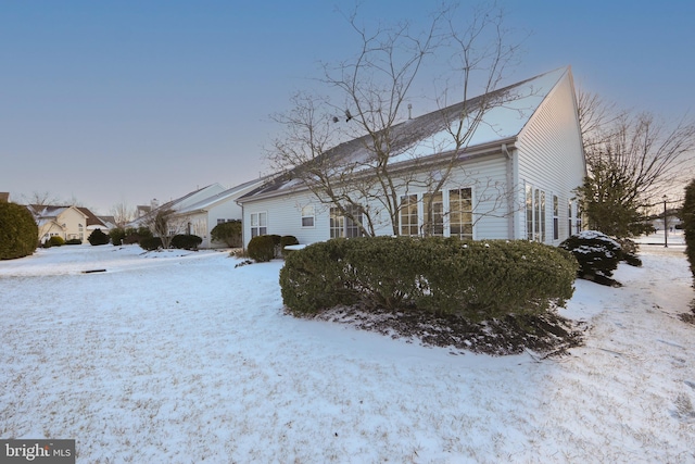 view of snow covered property