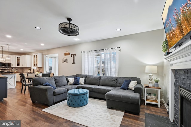 living room featuring dark hardwood / wood-style floors