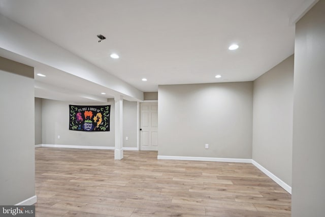 basement with light wood-type flooring