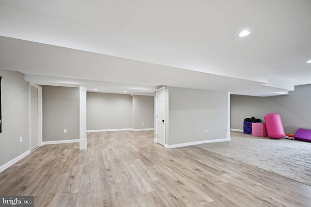 basement with light wood-type flooring