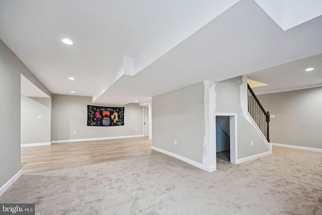 basement with light carpet