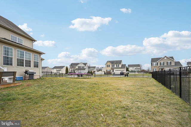 view of yard featuring a trampoline