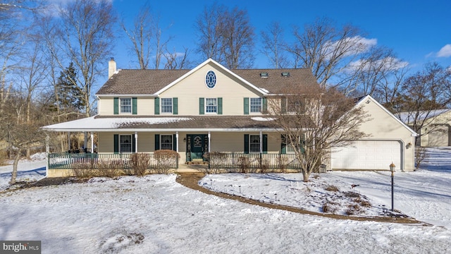 country-style home with a garage