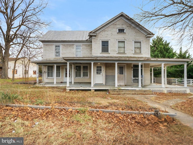 farmhouse inspired home featuring a porch