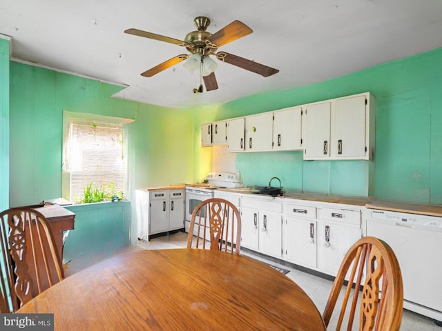 kitchen with ceiling fan, white cabinetry, white appliances, and sink