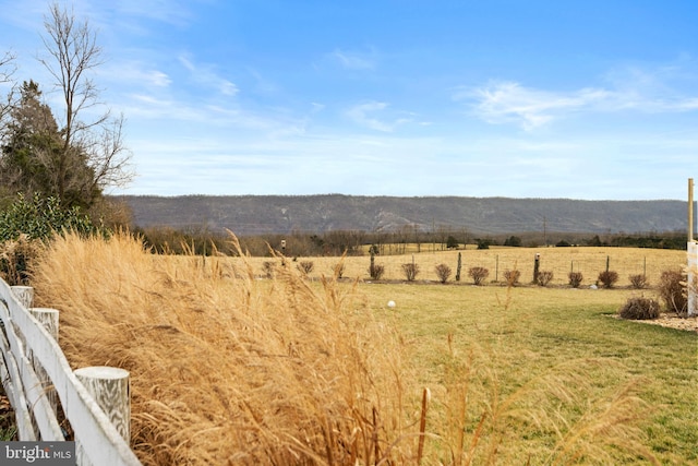 view of mountain feature with a rural view