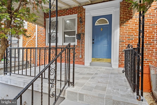 entrance to property with a porch