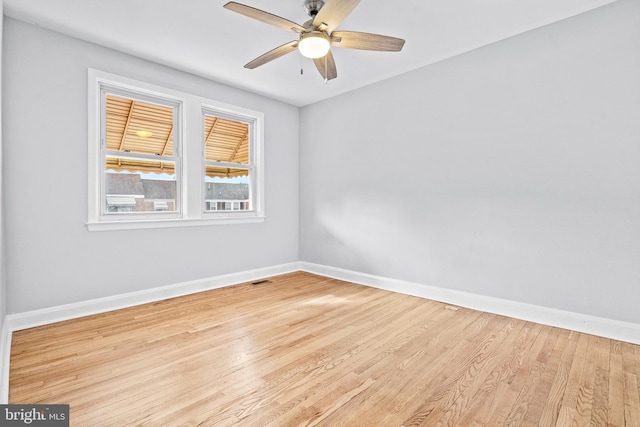 unfurnished room with ceiling fan and light hardwood / wood-style floors