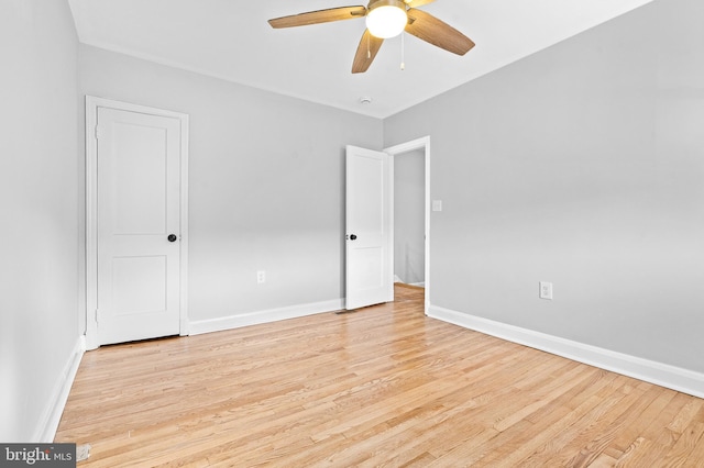 unfurnished room with light hardwood / wood-style floors and ceiling fan