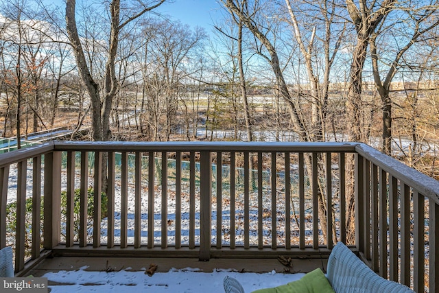 view of snow covered deck