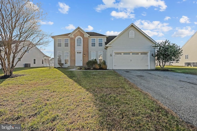 front of property featuring a garage, a front lawn, and central air condition unit