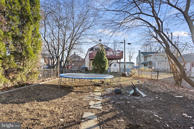 view of yard with a trampoline