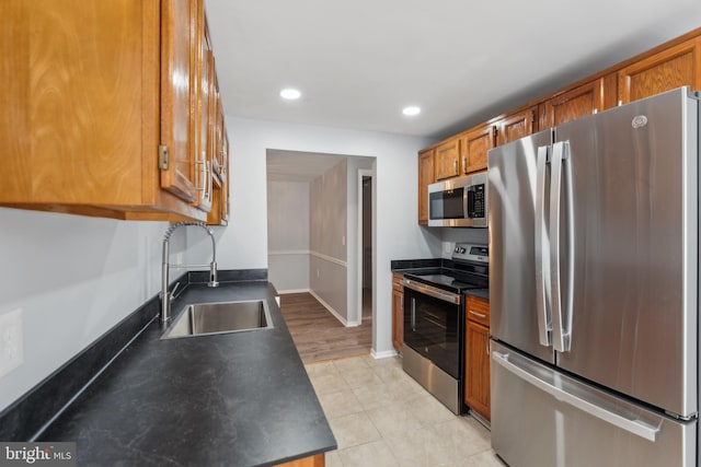 kitchen featuring sink and stainless steel appliances