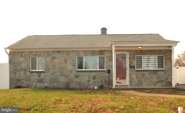 view of front of home with a front yard