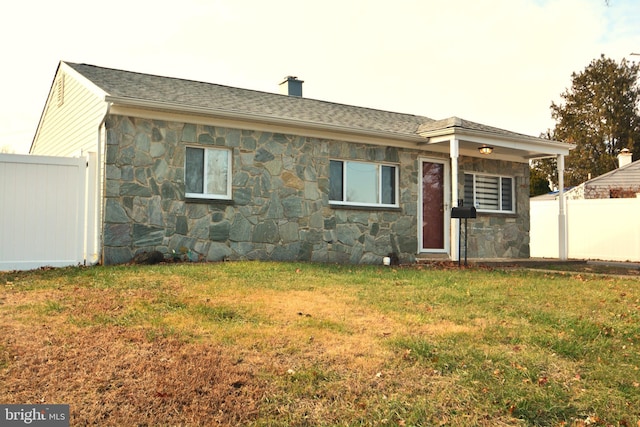 view of front of home with a front yard