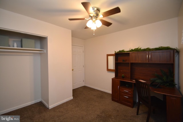 office area featuring ceiling fan and dark colored carpet