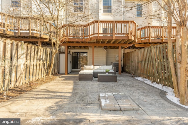 back of house with a patio area, a deck, and an outdoor living space