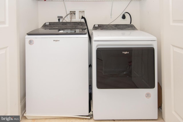 washroom featuring independent washer and dryer