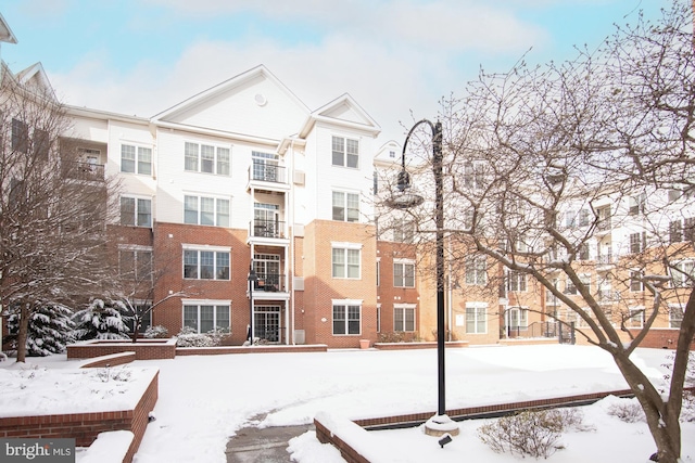 view of snow covered property