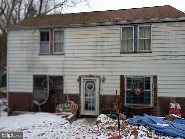 view of snow covered property