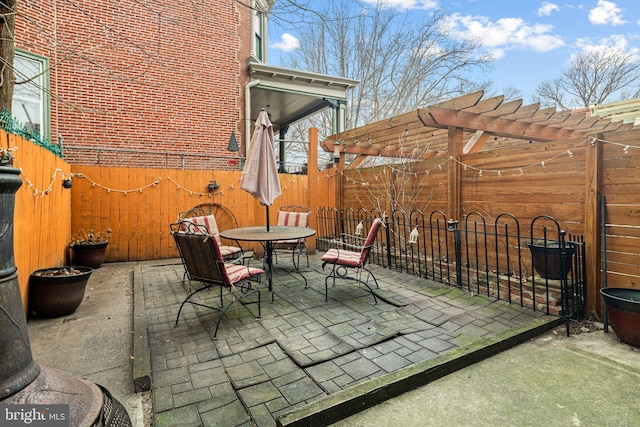 view of patio / terrace featuring a pergola