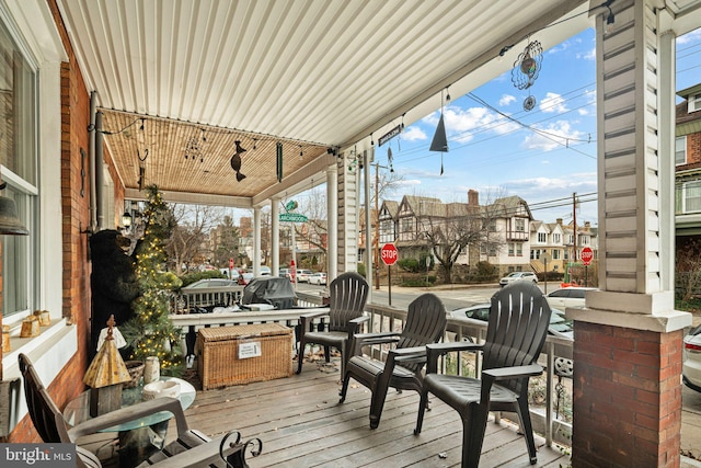 wooden deck with a porch