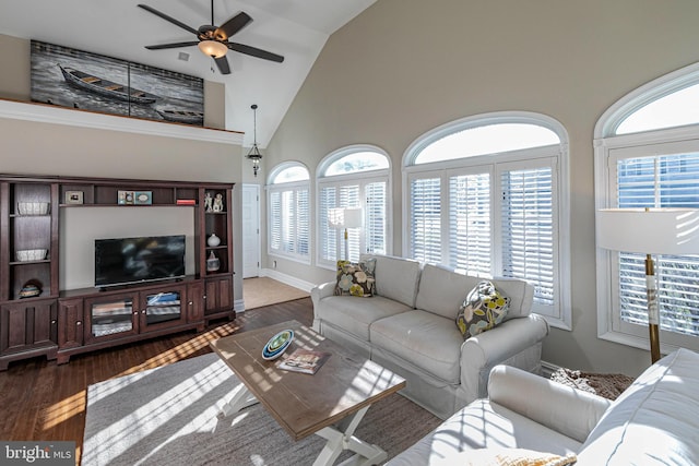 living room with dark hardwood / wood-style flooring, vaulted ceiling, and ceiling fan