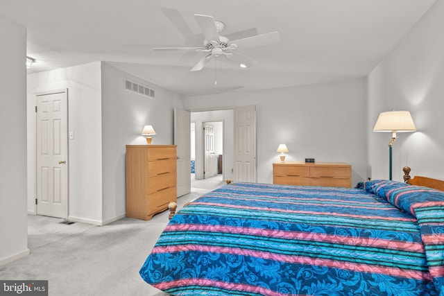 carpeted bedroom with ceiling fan