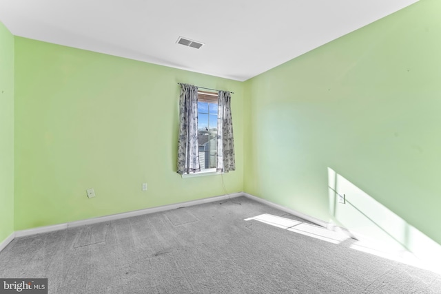 view of carpeted spare room